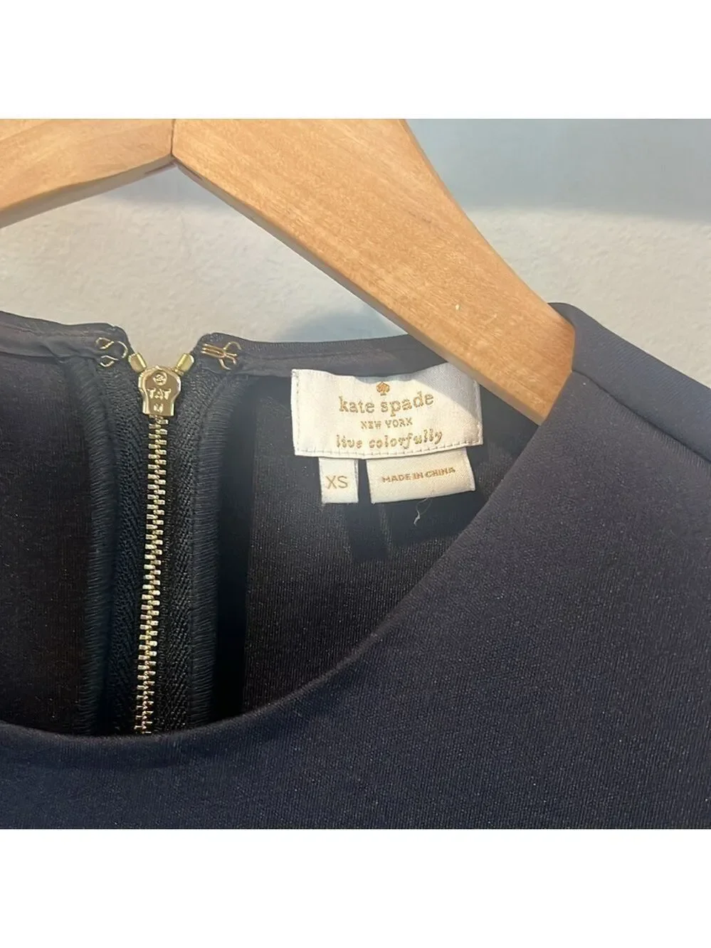 Kate spade black scuba peplum style back zip top size extra Small